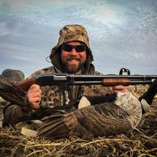 Bret with his grandpa's Model 12 and a goose in western Minnesota