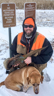 Bret with a western Minnesota rooster on a cold day